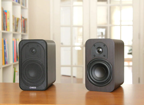 RB42 Reference Bookshelf Speakers With 4 Inch Woofer And Silk Tweeter, Dark Walnut Pair, on wooden desk in living room