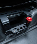 Slick Under Seat Fire Extinguisher Bracket For Ineos Grenadier Truck mount kit with red trigger handle and metal base.