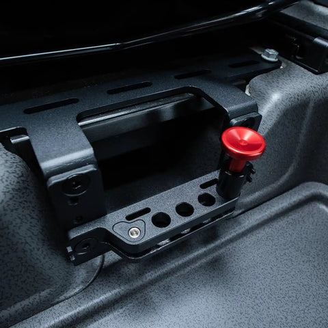 Slick Under Seat Fire Extinguisher Bracket For Ineos Grenadier Truck mount kit with red trigger handle and metal base.