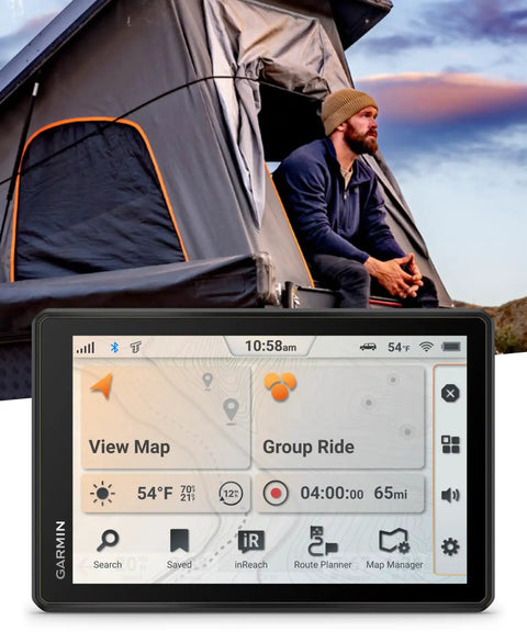 Rugged 8 Inch Off Road GPS Navigator For Off The Grid Adventures displayed in front of a man near a rooftop tent at sunset.