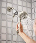 Engage Magnetix Six Function Detachable Handheld Showerhead With Magnetic Docking System, Spot Resistant Brushed Nickel Finish, held in hand