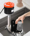 Heavy Duty Electric Commercial Glass Washer Slick Five Brush Upright Setup For Fast Beer Mugs Wine Glasses And Champagne Flute Washes With Zero Sweat Motor Cleaning In Bold Red Steel with glass being cleaned.