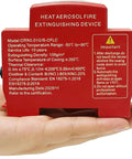 5 Pack Automatic Fire Extinguisher Guide Rail Mount Thermal Sensor Heat Activated Aerosol Suppression System 20g held in hand.