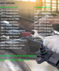 MAP Sensor Replacement For Hyundai And Kia Vehicles 39300-2B000 39300-2B100 shown on workshop counter with tools