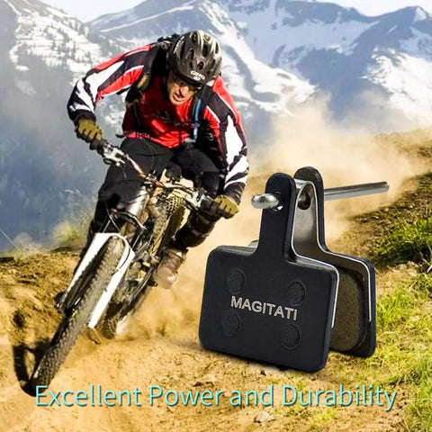 Mountain biker on trail with Four Pairs Resin Disc Brake Pads For Bikes With Universal Fit Built For TRP Tektro Shimano Deore