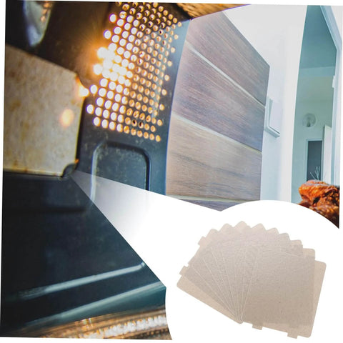 10 Pack Microwave Waveguide Mica Sheets Heat Resistant Insulation Covers Fireproof Shield for Kitchen Use image with microwave close-up.