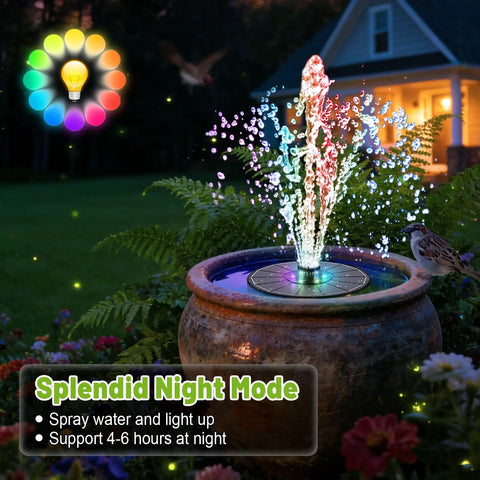 Solar Bird Bath Fountain With Colorful LED Lights And Adjustable Spray Heights, shown in garden setting at night with water spray.