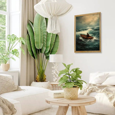 Framed Stormy Ocean Rowing Poster Canvas Print Art Vintage Contemporary Wall Decor in living room with plants and couch