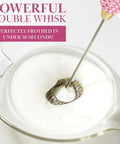 Electric Rhinestone Handheld Milk Frother With Double Coil Whisk And Gold Stand Pink Battery Powered Portable Frother For Lattes Cappuccinos And More Fast Foaming In Under 30 Seconds Requires 2 AA Batteries Not Included creating foam in a clear jug