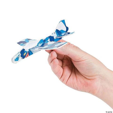 Foam Airplane Glider Toys Set Of 72 Pieces For Parties School Carnivals And Holiday Giveaways Lightweight 5.5 Inch Foam Flyers In Assorted Colors Perfect For Prizes And Party Favors displayed in hand