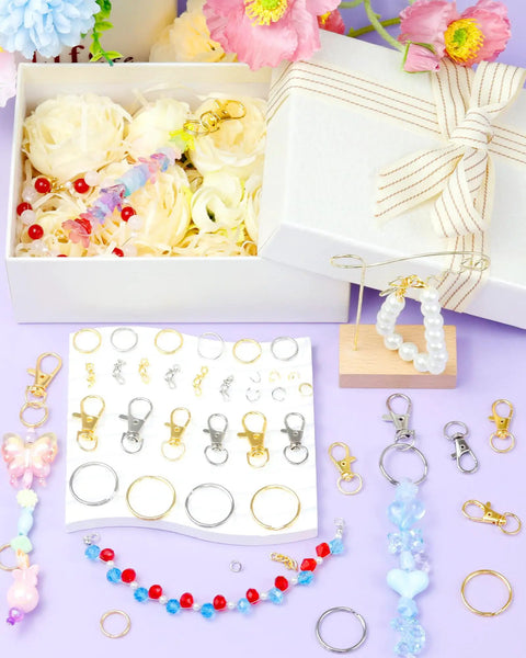 Totally Rad 990 Piece DIY Keychain Craft Kit Featuring Mixed Gold And Silver Assorted Metal Clasps Lobster Hooks And Swivel Snaps For Hella Awesome Charm Jewelry Making And Custom Bag Accessories with assorted hardware and charms.