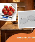 High Precision Kitchen Scale With 105 Oz Capacity And 0.01 Oz Accuracy, stainless steel surface with strawberries and dual trays