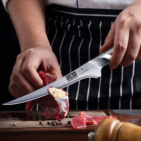 Person using 7 Inch Fillet Knife Razor Sharp Boning Knife In High Carbon Stainless Steel Pro Grade Japanese Style Fish Knife for meat cutting