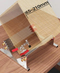 Heavy Duty Aluminum Table Saw Spline Clamp Jig With Four Flip Limiters And Uhmw Gliding Tracks For Dead Nuts Woodworking Joint Alignment and Slick Quick Setup Assembly with adjustable wood piece shown.