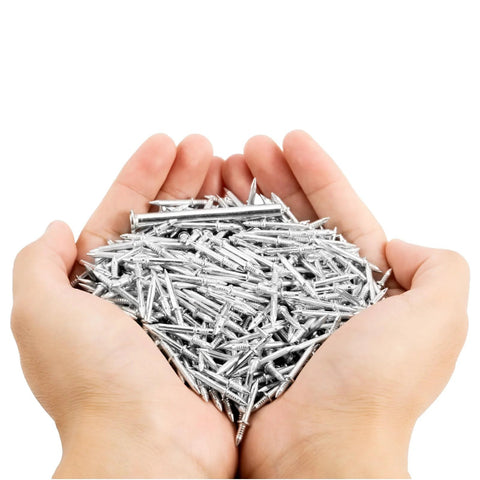 Hands holding Double Headed Skirting Nails With Six Sleeve Tools For Invisible Seamless Baseboard Installation And Trim, value pack of 600 nails