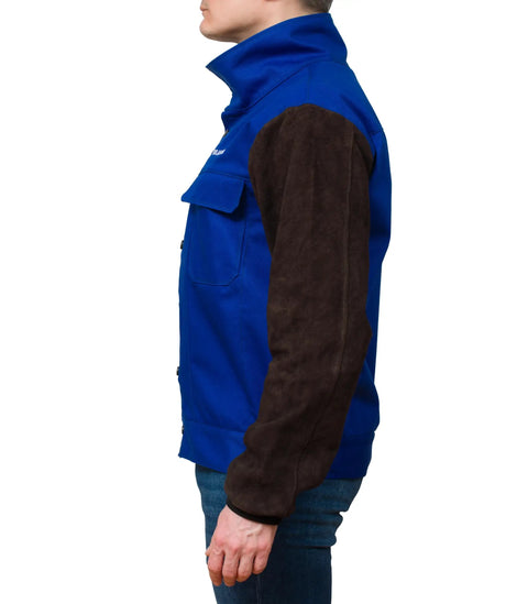 Side view of person wearing DVALIN Hybrid FR Leather Welding Jacket with leather sleeves and snap buttons for maximum protection.