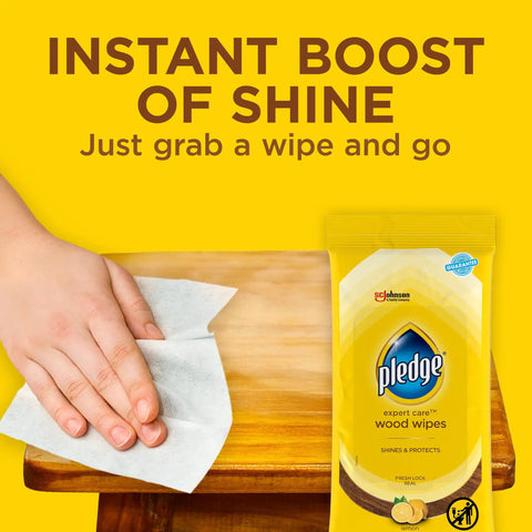 Hand using Expert Care Wood Wipes With Lemon Scent For Sealed Wood Leather Granite And Stainless Steel on wooden surface
