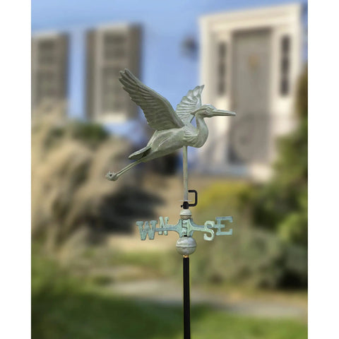 Blue Heron Garden Weathervane With 53 Inch Garden Pole Blue Verde Copper Patina in outdoor setting showing brass directionals