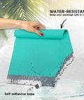 Teal Poly Mailers 6 By 9 Inches Self Seal Waterproof Shipping Envelopes shown with water-resistant feature