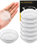 8 Pack 2 Inch Door Stoppers For Walls, Clear Rubber Door Handle Bumpers shown in hand and stacked, heavy-duty adhesive shields