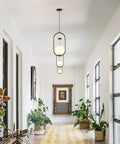 Modern Black Pendant Light With White Glass Globe Shade For Kitchen Island And Bedroom Matte Finish Ceiling Fixture Large Globe Pendant Light For Bedside Living Room Or Hallway Industrial Contemporary Style in a bright hallway