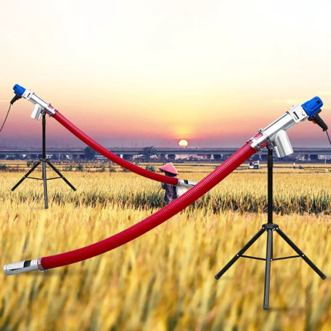 Grab And Go Portable Grain Pumping Suction Auger Screw Conveyor for small grains in a field at sunset, with red rubber hose.