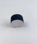 Side view of a single black foam piece from 25 Pack 36x20mm Sponge Piezo Trigger Cushions for electronic drum pads.