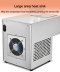 Heavy Duty Commercial Snow Cone Shaver Grinding Down Ice Blocks To Whip Up 198 Pounds Of Silky Shaved Flakes Daily With Tough Steel Cutters And Dependable Air Cooling For Street Vendors And Dessert Shops, showing large area heat sink and metal structure.