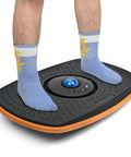 Person standing on Anti Fatigue Standing Desk Mat With Marble Top Balance Board And Wobble Rocker 360 Degree Rotation And 8 Tilt Angles