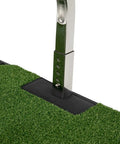 Close-up of adjustable ball mount height on Indoor Golf Swing Trainer with Real Turf Mat and suction pad base