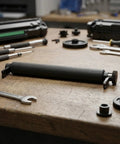 Rubber Bearing Platen Roller Kit For Zebra GK420D GX420D GK430D GX430D ZP450 ZP500 ZP505 ZP550 Printers To Prevent Paper Jams And Keep Work Flowing Smooth Like Butter High Quality Do Not Stress You Will Be Glad It Runs Smooth Guaranteed Today. black rubber platen roller with gear on workbench
