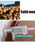 Solid wood logs stacked outdoors with a measurement tool showing thickness of 18mm, emphasizing durability.