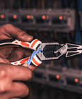 Heavy Duty 8 In 1 Linesman Pliers For Electrical DIY Projects Wire Cutter Crimper Stripper Twist Deburr Winding And More Go To Multipurpose CRV Steel Hand Tool For Crimping, Shearing, Gripping being used to strip blue wire.