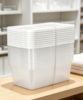 Top Tier Clear Plastic Storage Containers With Tight Snap On Lids Set Of Ten Real Deal Organizers For Home Closets Kitchen Pantry And Garage Must Haves stacked on a shelf.