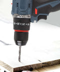 Built Different Cordless Drill And Screwdriver Kit With 25 Gear Torsion Electric Power Tool Set drilling into wood surface.