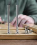 Nickel Plated Flat Head Hex Socket Frame Bolts And Furniture Screws Replacement Hardware Kit with assorted lengths on table.