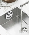 Smiley Face Stainless Steel Dish Sponge Holder With Suction Cup Silver Sink Caddy Organizer Storage in a modern kitchen sink