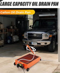 Heavy Duty Low Profile Oil Drain Pan Cart 15 Gallon Capacity With 180 Watt Electric Pump And 8 Foot Hose in a garage.