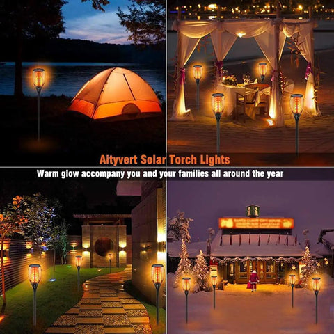 Upgraded Solar Flame Torch Lights Outdoor Waterproof Dancing Flame Garden Lights 43 Inch Tall With 96 LEDs Each Two Pack For Pathways Patios Yards And Landscape Decor illuminating various outdoor settings.