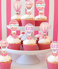 Cupcakes with 36 pink hot air balloon toppers for girls birthday party decorations Adventure Awaits baby shower decor airplane theme.