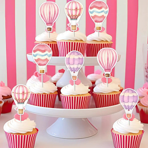 Cupcakes with 36 pink hot air balloon toppers for girls birthday party decorations Adventure Awaits baby shower decor airplane theme.