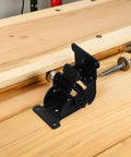 Black Iron Folding Leg Hinges With Anti Loosening Technology And Smooth Silent Operation on wooden bench
