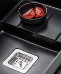 Solid Granite Composite Vessel Sink Featuring A Flat Out Stain Resistant Finish And Zero Hassle Drain Setup Perfect For Quick Kitchen Bathroom Overhauls And Commercial Hotel Remodels with bowl and tomatoes.