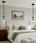 SeeU 2-Pack Black Pendant Light Kitchen Island, Crackle Glass Light Fixture hanging above a stylish bed in a modern bedroom.
