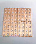 Top Shelf 16 Piece Purple Copper Battery Bus Bar Connection Plates for 5.5 6.2 and 6.9 Ah Lithium Cells laid out showing four hole layout.