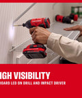 High Octane V20 Cordless Drill And Impact Driver Combo Kit Including Two Ah Battery Charger With 1700 Rpm Motor 1/2 Inch Chuck Led Work Light For Serious Weekend Warrior Shop Projects using LED light to drill into a wall.