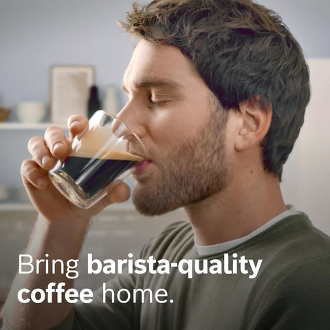 Person enjoying espresso with text 'Bring barista-quality coffee home'