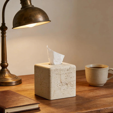 Heavy Resin Tissue Box Cover With Travertine Texture For Home Decor on a wooden table next to a lamp and coffee mug