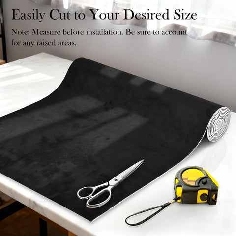 Automotive headliner fabric roll in black suede, foam backed, 96 by 60 inches, shown with scissors and tape measure.