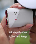 Golfer using TL1 Golf Rangefinder With Slope And Magnet And Dual Color OLED For Low Light Play; 6x magnification, 1000 yd range.